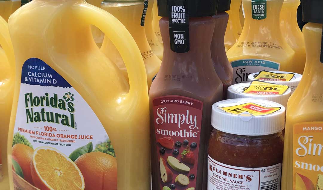 orange juice and fruit smoothie containers