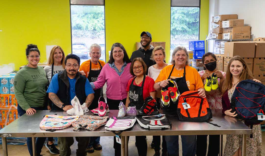 volunteers preparing backpacks