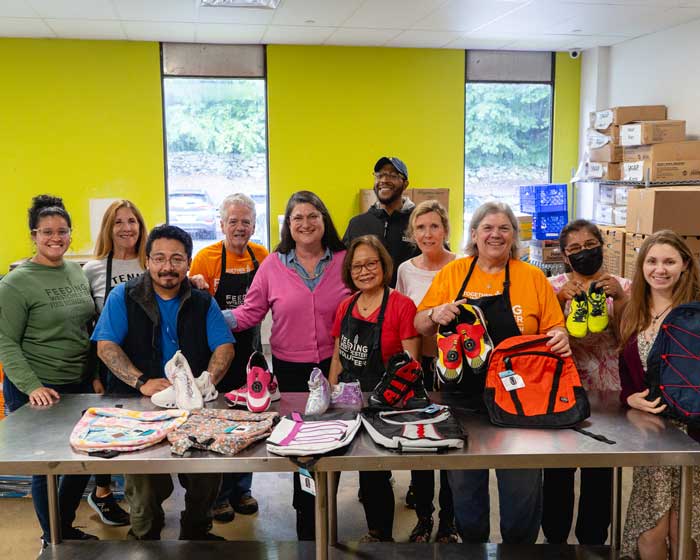 volunteers preparing backpacks